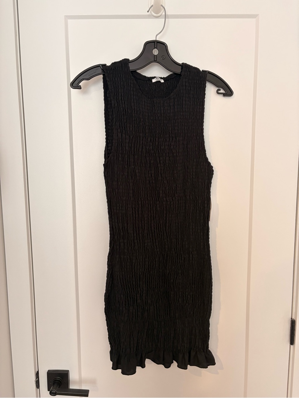 Ardene Black Sleeveless Crinkle Knit Ruffle-Hem Dress